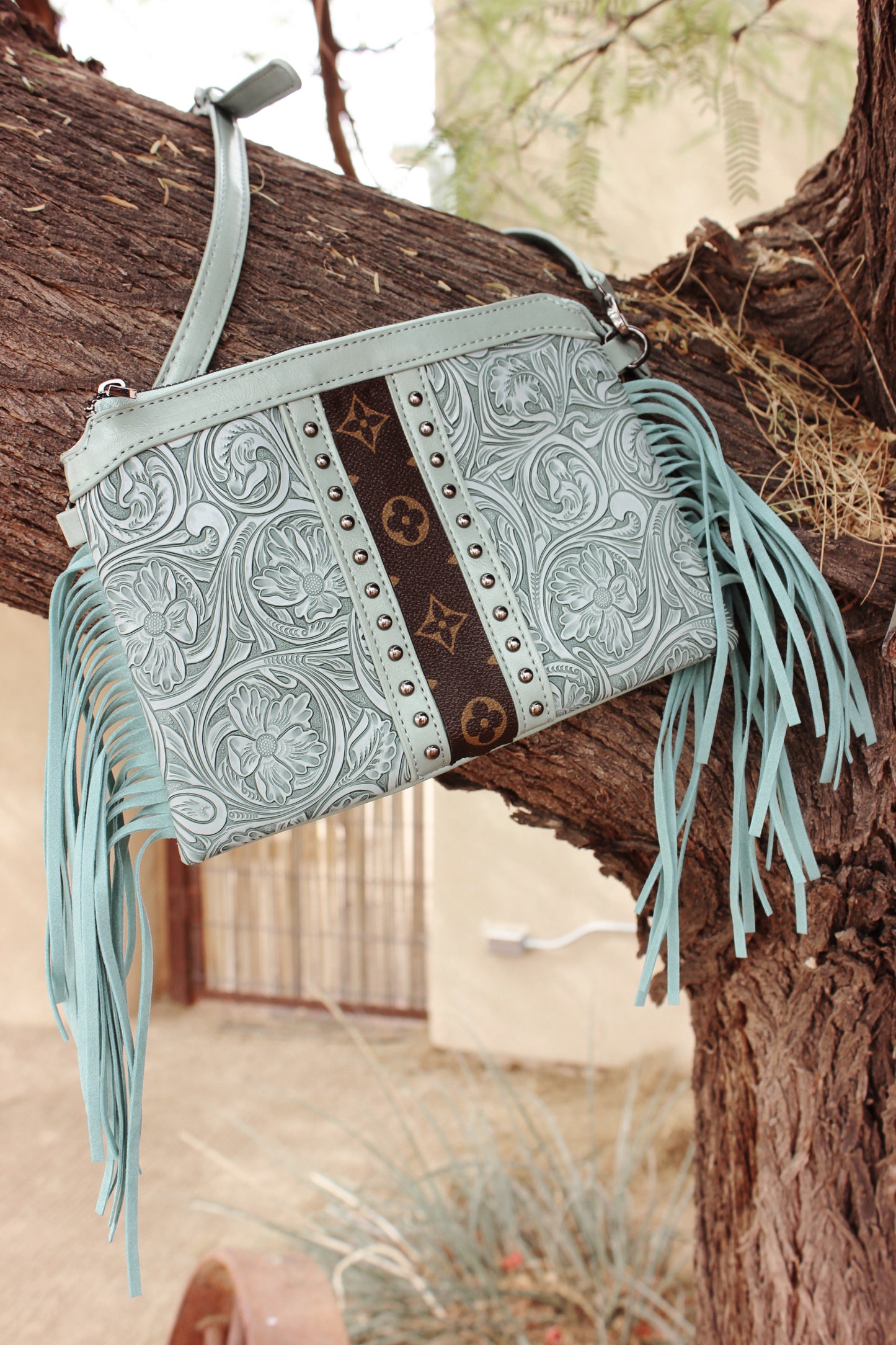 LV Embossed Leather Crossbody Light Blue