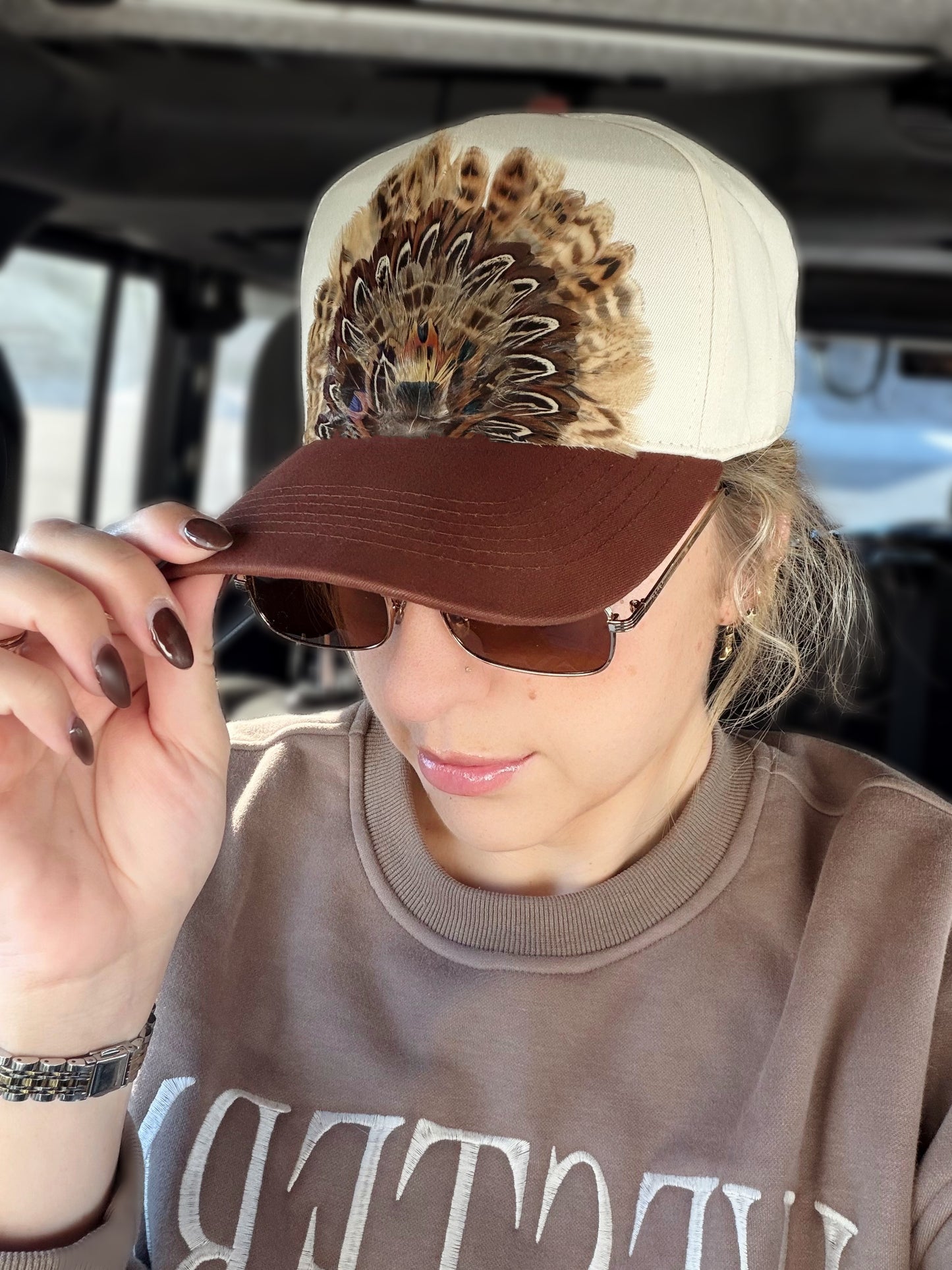Feathered and Fearless Trucker Hat